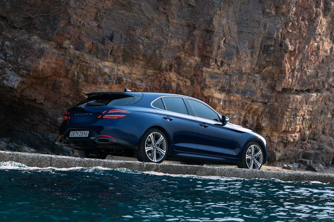 luxury car on coastal road