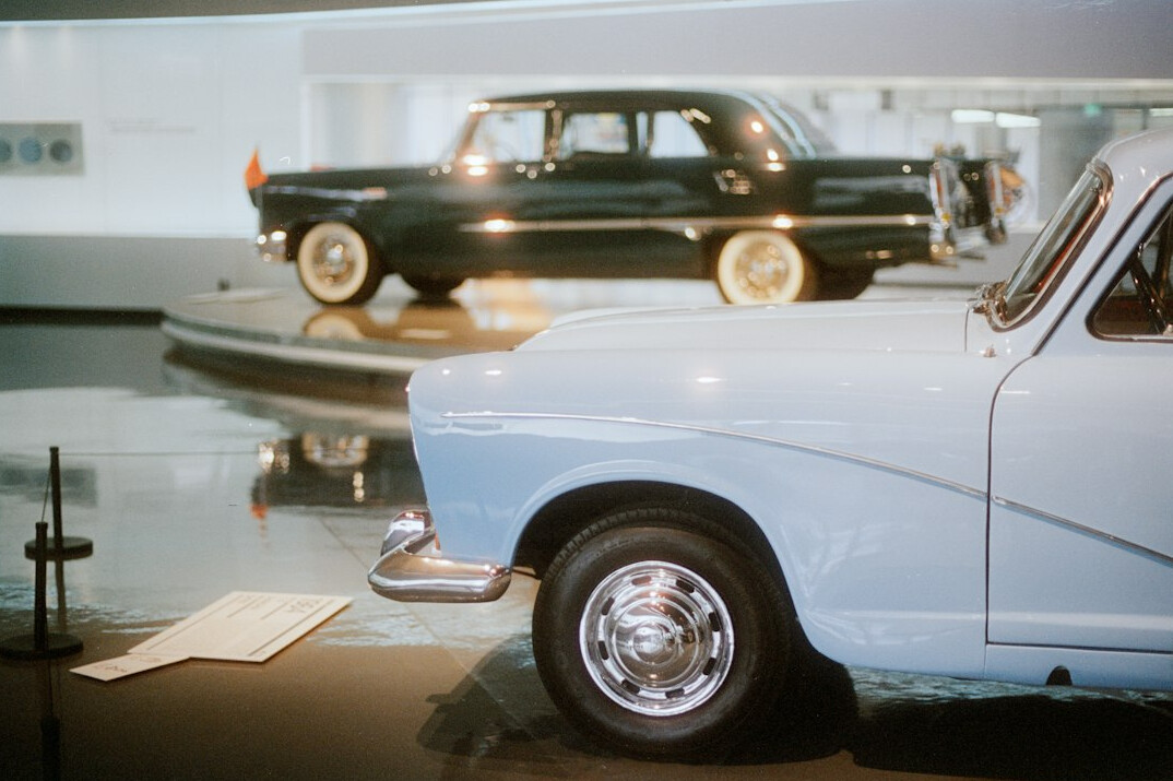 Classic car museum hall with vintage automobiles