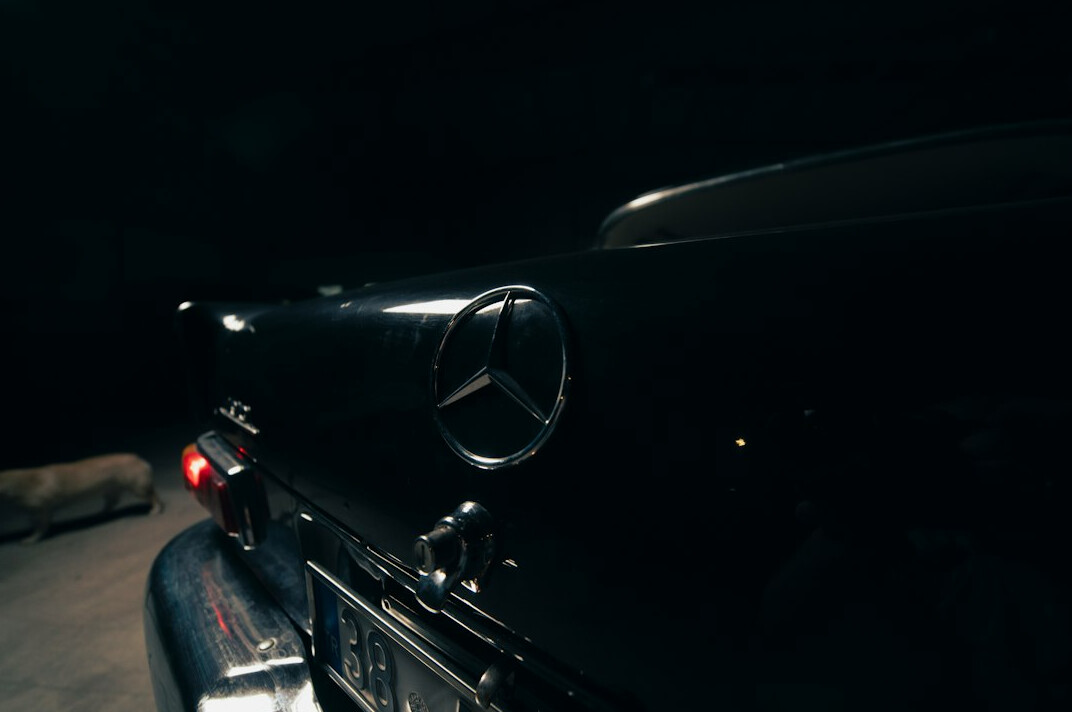 Sports car close-up in a dark studio