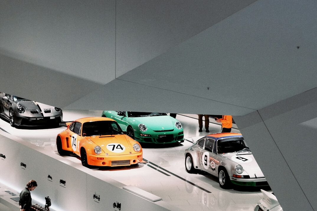Collection of classic sports cars in an exhibition space